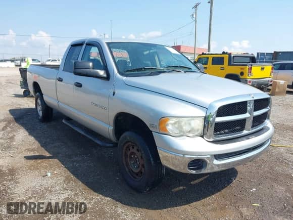 2005 Dodge 1500 SLT z VIN 1D7HU18D05J575646, wystawiony jako IAAI lot #43203572 z przebiegiem Nie podano mil oraz . Historia ofert i sprzedaży dostępna na DreamBid. Obrazek 6.