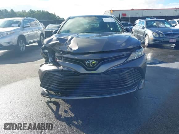 2019 Toyota Camry SE z VIN 4T1B11HK6KU831382, wystawiony jako IAAI lot #43426768 z przebiegiem 137 060 mil mil oraz . Historia ofert i sprzedaży dostępna na DreamBid. Obrazek 13.
