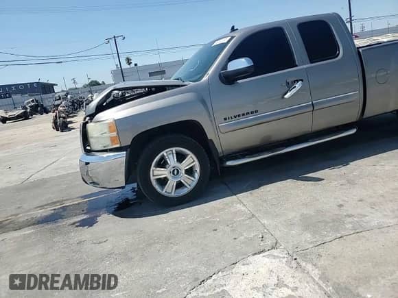 2012 Chevrolet Silverado 1500 LT with VIN 1GCRCSE05CZ214047, listed as a Copart auction lot 70232155 with 126,241 mi miles and Salvage title. Bid and sale history available at DreamBid. Image 13.
