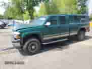 1999 Chevrolet Silverado 2500 LT with VIN 1GCGK29U0XE172746, listed as a Copart auction lot 54740025 with 226,410 mi miles and Salvage title. Bid and sale history available at DreamBid. Image 1.