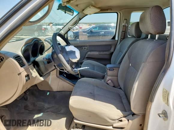 2002 Nissan Frontier XE with VIN 1N6DD26S82C318165, listed as a Copart auction lot 65472755 with 196,183 mi miles and Salvage title. Bid and sale history available at DreamBid. Image 7.