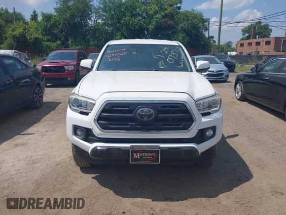 2018 Toyota Tacoma SR with VIN 5TFRX5GN8JX107937, listed as a IAAI auction lot 42940231 with 171,058 mi miles and . Bid and sale history available at DreamBid. Image 12.