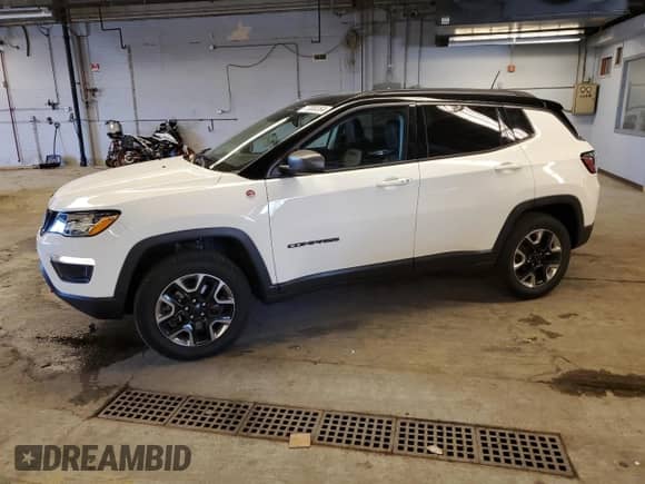 2018 Jeep Compass Trailhawk с VIN 3C4NJDDB0JT163497, выставлен на аукционе Copart как лот 77000364 с пробегом 28 681 миль миль и Списание • Salvage title. История ставок и продаж доступна на DreamBid. Изображение 1.