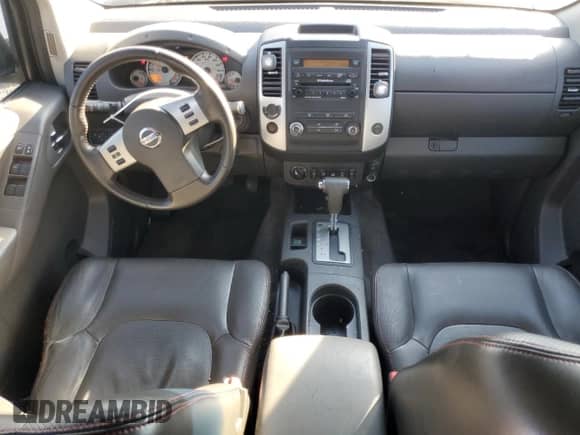 2010 Nissan Frontier Pro-4X z VIN 1N6AD0EV6AC431677, wystawiony jako Copart lot #81781165 z przebiegiem 147 473 mil mil oraz Szkoda całkowita • Salvage title. Historia ofert i sprzedaży dostępna na DreamBid. Obrazek 8.