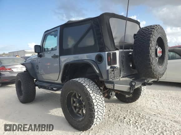2015 Jeep Wrangler Rubicon z VIN 1C4BJWCG9FL542089, wystawiony jako Copart lot #76111634 z przebiegiem Nie podano mil oraz Nie do naprawy • Non repairable. Historia ofert i sprzedaży dostępna na DreamBid. Obrazek 2.