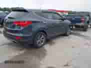 2015 Hyundai Santa Fe z VIN 5XYZTDLB8FG261026, wystawiony jako IAAI lot #42872886 z przebiegiem 146 244 mil mil oraz . Historia ofert i sprzedaży dostępna na DreamBid. Obrazek 4.