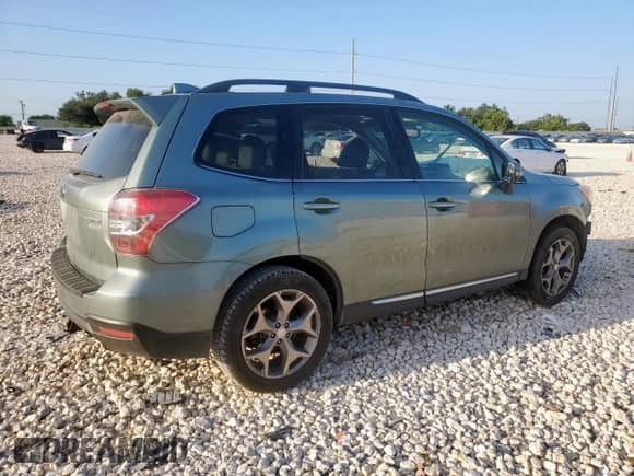 2016 Subaru Forester Touring with VIN JF2SJAXC1GH410511, listed as a Copart auction lot 68792995 with 146,911 mi miles and Salvage title. Bid and sale history available at DreamBid. Image 3.