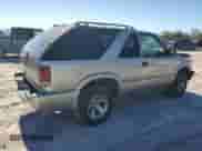 1999 Chevrolet Blazer LS с VIN 1GNCS18W4XK190199, выставлен на аукционе Copart как лот 81499174 с пробегом 161 229 миль миль и Списание • Salvage title. История ставок и продаж доступна на DreamBid. Изображение 3.