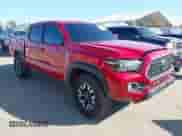 2021 Toyota Tacoma SR z VIN 5TFCZ5AN0MX262902, wystawiony jako IAAI lot #43535009 z przebiegiem 70 926 mil mil oraz . Historia ofert i sprzedaży dostępna na DreamBid. Obrazek 1.