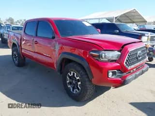 2021 Toyota Tacoma SR z VIN 5TFCZ5AN0MX262902, wystawiony jako IAAI lot #43535009 z przebiegiem 70 926 mil mil oraz . Historia ofert i sprzedaży dostępna na DreamBid. Obrazek 1.