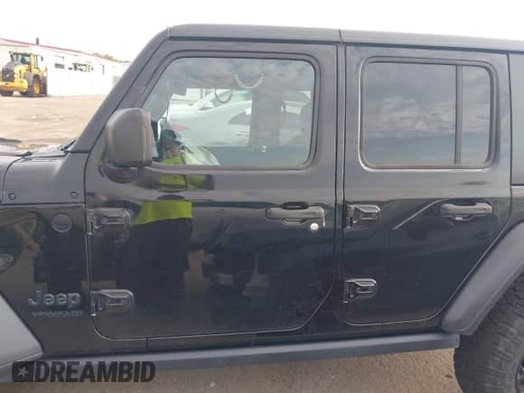 2021 Jeep Wrangler Unlimited Willys with VIN 1C4HJXDN7MW649070, listed as a IAAI auction lot 42656152 with 53,227 mi miles and . Bid and sale history available at DreamBid. Image 14.