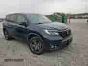 2021 Honda Passport EX-L with VIN 5FNYF8H53MB004552, listed as a Copart auction lot 70690565 with 100,370 mi miles and Salvage title. Bid and sale history available at DreamBid. Image 13.