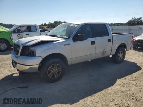 2005 Ford F-150 XLT with VIN 1FTRW14W55FA44896, listed as a Copart auction lot 71074945 with 284,443 mi miles and Salvage title. Bid and sale history available at DreamBid. Image 1.