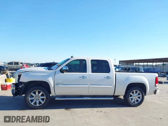 2013 GMC Sierra 1500 Denali z VIN 3GTP2XE24DG345268, wystawiony jako IAAI lot #43357777 z przebiegiem 168 765 mil mil oraz . Historia ofert i sprzedaży dostępna na DreamBid. Obrazek 14.