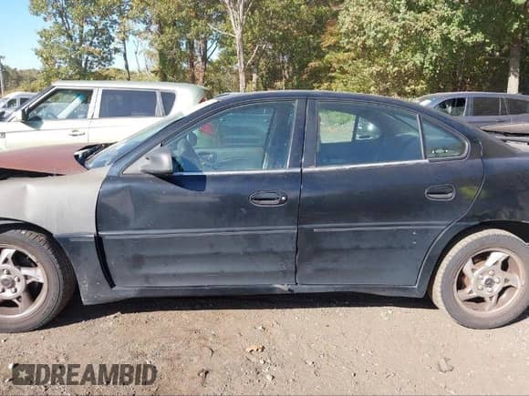 2002 Pontiac Grand Am GT z VIN 1G2NW52E32M652511, wystawiony jako IAAI lot #41148345 z przebiegiem 167 038 mil mil oraz . Historia ofert i sprzedaży dostępna na DreamBid. Obrazek 13.