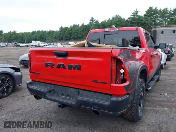 2022 Ram 1500 Rebel z VIN 1C6SRFLT1NN183823, wystawiony jako IAAI lot #42639735 z przebiegiem 36 048 mil mil oraz . Historia ofert i sprzedaży dostępna na DreamBid. Obrazek 16.