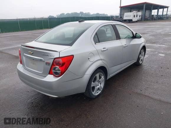 2015 Chevrolet Sonic LTZ with VIN 1G1JE5SB2F4123973, listed as a IAAI auction lot 42428071 with 137,672 mi miles and . Bid and sale history available at DreamBid. Image 4.