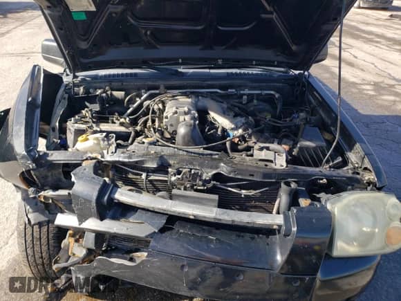 2003 Nissan Frontier SVE with VIN 1N6MD29Y93C430782, listed as a Copart auction lot 43594545 with 164,705 mi miles and Salvage title. Bid and sale history available at DreamBid. Image 11.