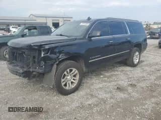2015 Chevrolet Suburban LT с VIN 1GNSKJKC9FR505966, выставлен на аукционе Copart как лот 81973265 с пробегом 231 508 миль миль и Списание • Salvage title. История ставок и продаж доступна на DreamBid. Изображение 1.