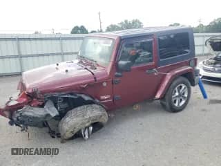 2007 Jeep Wrangler Sahara z VIN 1J4FA54137L205242, wystawiony jako Copart lot #65080025 z przebiegiem 128 682 mil mil oraz Szkoda całkowita • Salvage title. Historia ofert i sprzedaży dostępna na DreamBid. Obrazek 1.