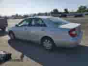 2002 Toyota Camry LE with VIN 4T1BE32K42U552229, listed as a Copart auction lot 84379825 with 258,234 mi miles and Salvage title. Bid and sale history available at DreamBid. Image 2.