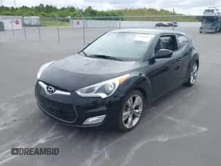 2013 Hyundai Veloster w/Black Int with VIN KMHTC6AD0DU106306, listed as a IAAI auction lot 43409235 with 82,350 mi miles and . Bid and sale history available at DreamBid. Image 2.