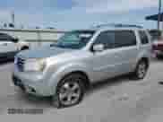 2014 Honda Pilot EX-L with VIN 5FNYF3H6XEB017828, listed as a Copart auction lot 53206475 with 217,412 mi miles and Salvage title. Bid and sale history available at DreamBid. Image 1.