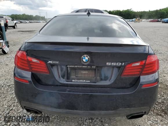 2015 BMW 5 Series 550i xDrive with VIN WBAKP9C54FD980038, listed as a Copart auction lot 56051025 with 83,889 mi miles and Salvage title. Bid and sale history available at DreamBid. Image 6.