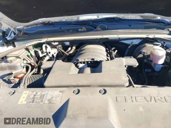 2019 Chevrolet Suburban Premier with VIN 1GNSCJKC0KR293658, listed as a IAAI auction lot 40563834 with 153,619 mi miles and . Bid and sale history available at DreamBid. Image 10.