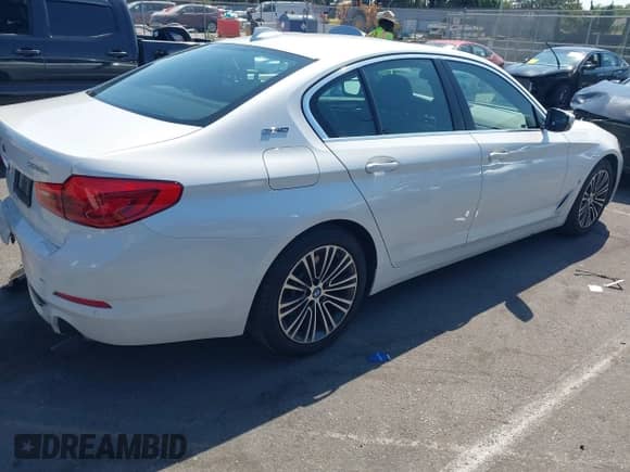 2019 BMW 5 Series 530e with VIN WBAJA9C56KB253941, listed as a IAAI auction lot 43010702 with 100,222 mi miles and . Bid and sale history available at DreamBid. Image 4.