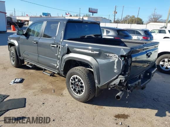 2024 Toyota Tacoma SR5 with VIN 3TYLB5JN0RT029530, listed as a IAAI auction lot 41213742 with 5,370 mi miles and . Bid and sale history available at DreamBid. Image 3.