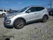 2014 Hyundai Santa Fe z VIN 5XYZUDLB5EG228156, wystawiony jako Copart lot #81571625 z przebiegiem 104 401 mil mil oraz Szkoda całkowita • Salvage title. Historia ofert i sprzedaży dostępna na DreamBid. Obrazek 1.