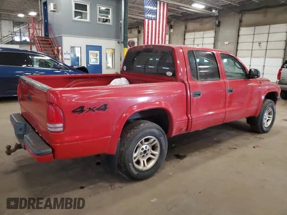 2003 Dodge Dakota Sport with VIN 1D7HG38N23S204989, listed as a Copart auction lot 49732705 with 190,921 mi miles and Non repairable. Bid and sale history available at DreamBid. Image 3.