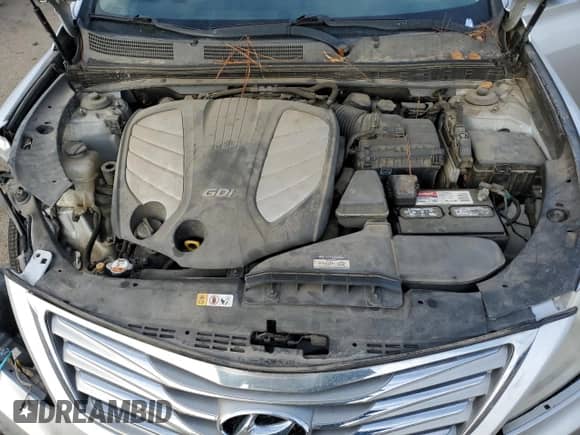 2012 Hyundai Azera с VIN KMHFH4JGXCA173802, выставлен на аукционе Copart как лот 82128484 с пробегом 111 475 миль миль и Списание • Salvage title. История ставок и продаж доступна на DreamBid. Изображение 11.