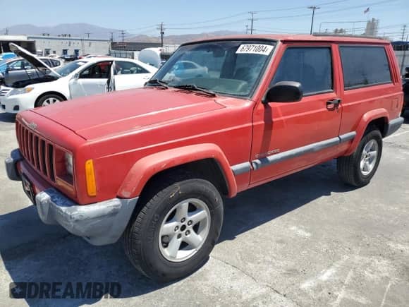 1999 Jeep Grand Cherokee with VIN 1J4FT67SXXL636357, listed as a Copart auction lot 67971004 with 158,134 mi miles and Clean title. Bid and sale history available at DreamBid. Image 1.