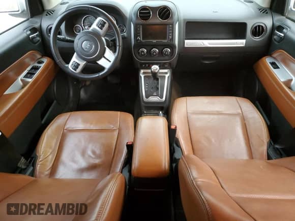 2014 Jeep Compass Limited z VIN 1C4NJDCB3ED500919, wystawiony jako Copart lot #63126535 z przebiegiem 99 312 mil mil oraz Szkoda całkowita • Salvage title. Historia ofert i sprzedaży dostępna na DreamBid. Obrazek 8.