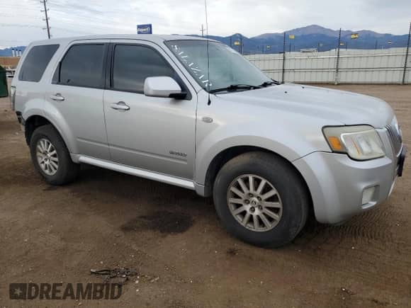 2008 Mercury Mariner Premier with VIN 4M2CU97148KJ08460, listed as a Copart auction lot 85178725 with 297,948 mi miles and Salvage title. Bid and sale history available at DreamBid. Image 4.