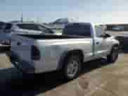 2002 Dodge Dakota z VIN 1B7FL16X72S632397, wystawiony jako Copart lot #87450164 z przebiegiem Nie podano mil oraz Szkoda całkowita • Salvage title. Historia ofert i sprzedaży dostępna na DreamBid. Obrazek 3.