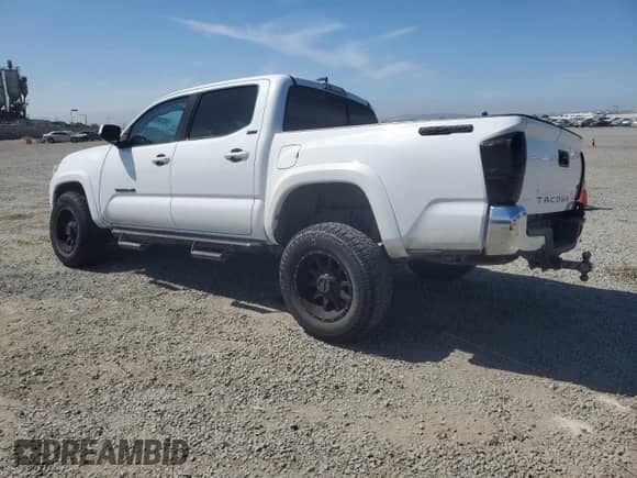 2020 Toyota Tacoma SR5 с VIN 3TMAZ5CN0LM120428, выставлен на аукционе Copart как лот 69748535 с пробегом 147 306 миль миль и Списание • Salvage title. История ставок и продаж доступна на DreamBid. Изображение 2.