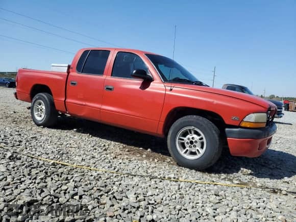 2000 Dodge Dakota Sport с VIN 1B7GL2AX1YS654082, выставлен на аукционе Copart как лот 48739565 с пробегом 199 845 миль миль и Списание • Salvage title. История ставок и продаж доступна на DreamBid. Изображение 4.