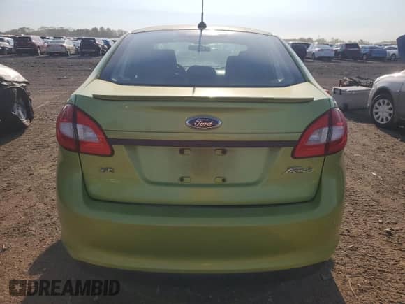 2011 Ford Fiesta SE с VIN 3FADP4BJXBM240012, выставлен на аукционе Copart как лот 71398335 с пробегом Не указан миль и Списание • Salvage title. История ставок и продаж доступна на DreamBid. Изображение 6.
