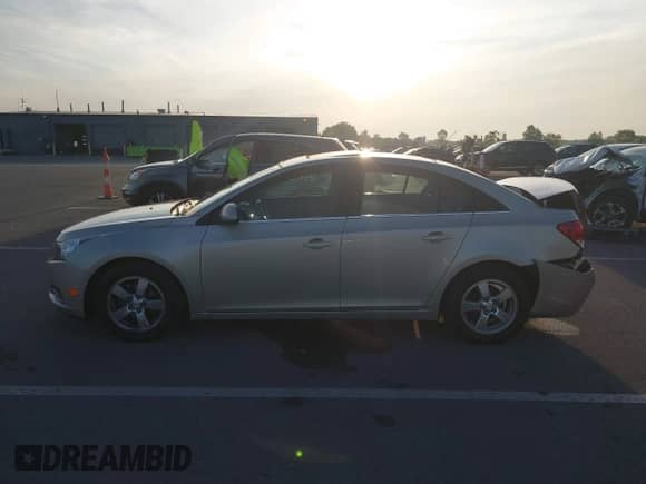 2014 Chevrolet Cruze 1LT with VIN 1G1PC5SB3E7350991, listed as a IAAI auction lot 43212960 with 76,522 mi miles and . Bid and sale history available at DreamBid. Image 15.