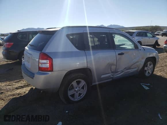 2007 Jeep Compass Sport with VIN 1J8FF47W47D136671, listed as a Copart auction lot 69504735 with Not provided miles and Salvage title. Bid and sale history available at DreamBid. Image 3.