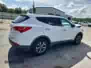 2016 Hyundai Santa Fe with VIN 5XYZU3LB2GG335212, listed as a Copart auction lot 65273225 with 107,801 mi miles and Salvage title. Bid and sale history available at DreamBid. Image 3.
