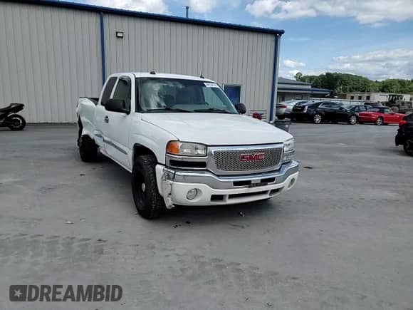 2004 GMC Sierra 1500 SLT z VIN 2GTEK19T841367242, wystawiony jako Copart lot #69794725 z przebiegiem 256 017 mil mil oraz Szkoda całkowita • Salvage title. Historia ofert i sprzedaży dostępna na DreamBid. Obrazek 13.