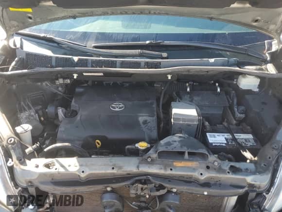 2012 Toyota Sienna LE with VIN 5TDKK3DC4CS179802, listed as a Copart auction lot 84264155 with 241,326 mi miles and Clean title. Bid and sale history available at DreamBid. Image 12.