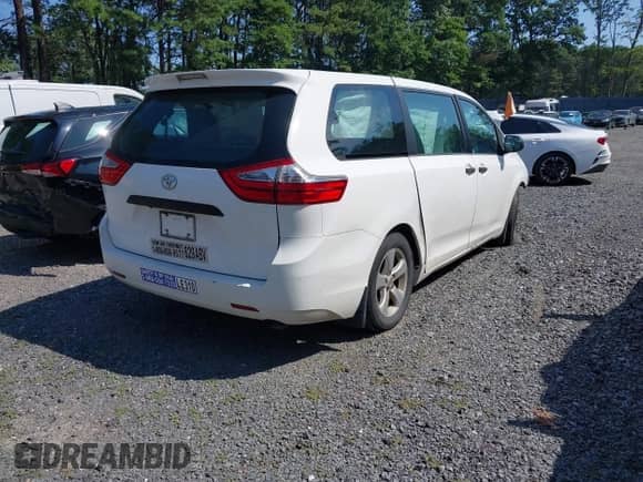 2015 Toyota Sienna L with VIN 5TDZK3DC6FS685540, listed as a IAAI auction lot 42756772 with 102,045 mi miles and . Bid and sale history available at DreamBid. Image 4.