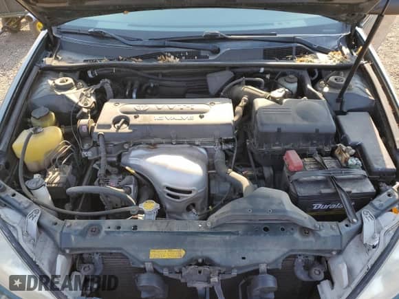 2003 Toyota Camry LE z VIN JTDBE32K030139057, wystawiony jako Copart lot #71503125 z przebiegiem 74 753 mil mil oraz Szkoda całkowita • Salvage title. Historia ofert i sprzedaży dostępna na DreamBid. Obrazek 11.