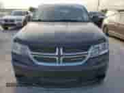2014 Dodge Journey American Value with VIN 3C4PDCAB1ET283961, listed as a Copart auction lot 65348255 with 200,998 mi miles and Salvage title. Bid and sale history available at DreamBid. Image 5.