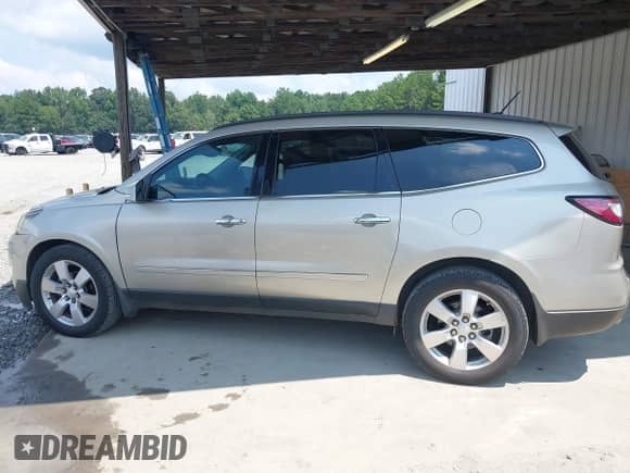 2014 Chevrolet Traverse LTZ with VIN 1GNKVJKD8EJ158689, listed as a IAAI auction lot 43038655 with 215,382 mi miles and . Bid and sale history available at DreamBid. Image 14.